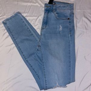 Fashion Nova light wash ripped skinny jean